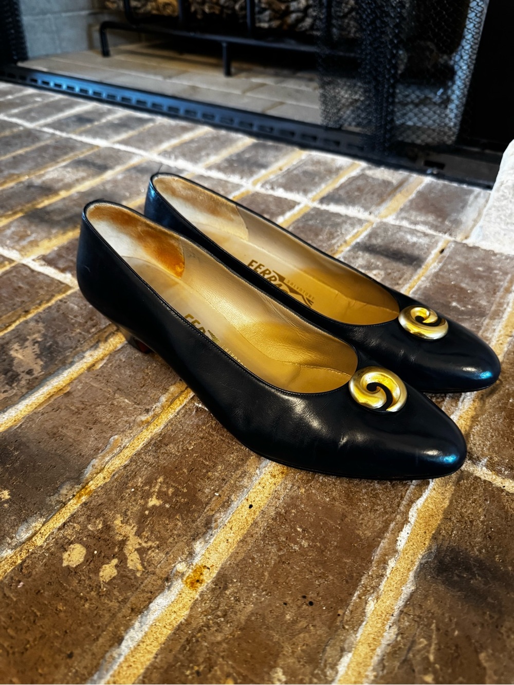 Salvatore Ferragamo Black Leather shoes with Gold Spiral Accent